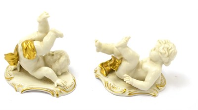 Lot 578 - A pair of porcelain cherubs