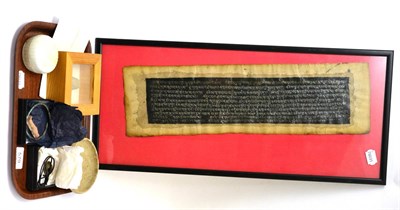 Lot 579 - A group of antiquities including a celadon box, Tibetan sutra page (framed), Chinese sang head...