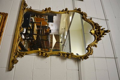 Lot 1036 - Gilt framed over mantel mirror in the Rococo taste