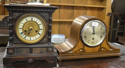 Lot 1045 - An American mantel clock together with an Edwardian inlaid mahogany mantel clock