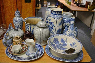 Lot 1059 - A quantity of decorative blue and white ceramics including jars and covers, Oriental style...