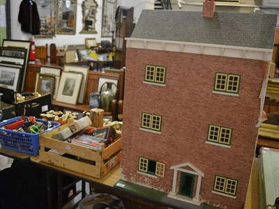 Lot 1065 - A collection of Diecast toys, some in original boxes and a dolls house