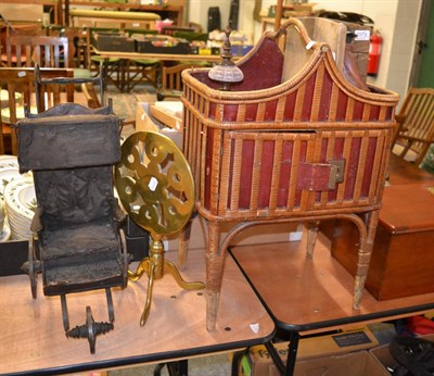 Lot 1073 - A wicker work box, a 19th century brass trivet, 19th century dog cart, pair of bookends and a...