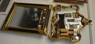 Lot 1147 - Rococo style gilt framed mirror, together with another Period style parcel gilt and part...