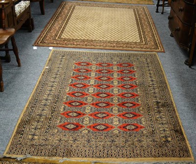 Lot 1158 - A Bokhara style rug and another Middle Eastern rug