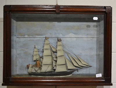 Lot 1177 - An oak framed diorama of a triple masted ship