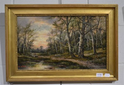 Lot 1179 - An oil on canvas depicting a river, woodland scene, signed S William