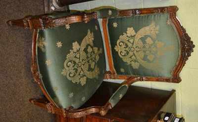 Lot 1282 - Pair of late 19th century carved and upholstered open armchairs