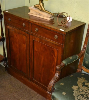 Lot 1285 - A 19th century mahogany cabinet fitted with a single frieze drawer above two cupboard doors