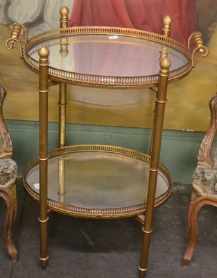 Lot 1289 - Period style gilt metal mirrored two tier tray table