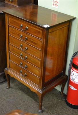 Lot 1290 - An Edwardian music cabinet