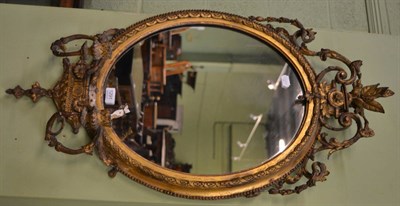 Lot 1291 - A 19th century giltwood twin light wall mirror