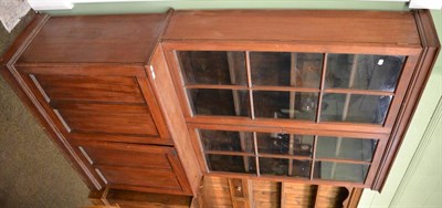 Lot 1298 - Bookcase cabinet with glazed upper section, the lower section with panelled cupboard doors