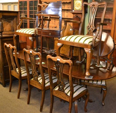 Lot 1302 - Twin pedestal dining table, together with a set of eight dining chairs (including two carvers)