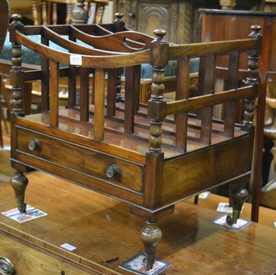 Lot 1313 - A 19th century four division canterbury fitted with a drawer