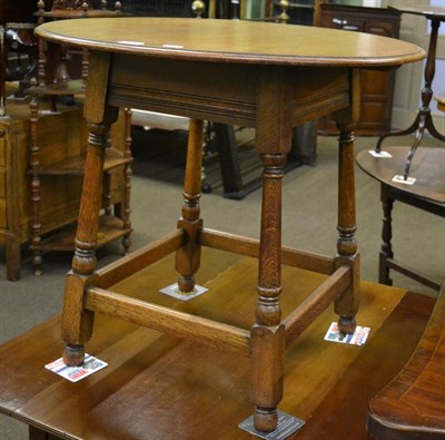 Lot 1328 - An oak circular pub table