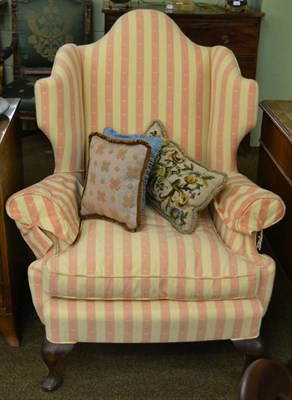 Lot 1337 - George III style wingback armchair