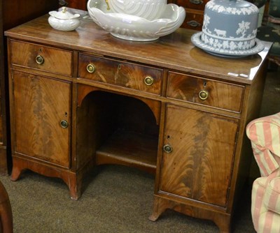 Lot 1338 - A 19th century knee hole desk