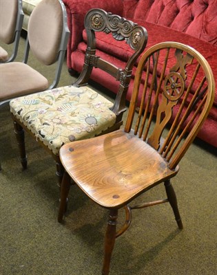 Lot 1347 - Yew wood and ash wheel back kitchen chair, 19th century and a Regency rosewood dining chair (2)