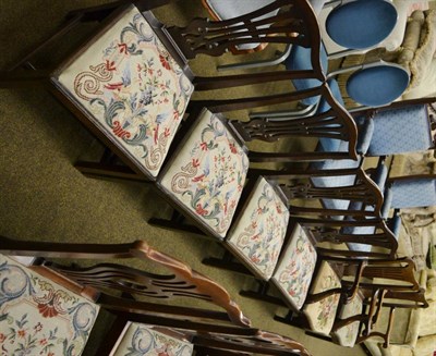 Lot 1361 - A set of four mahogany dining chairs with drop in needlework seats, together with a pair of similar