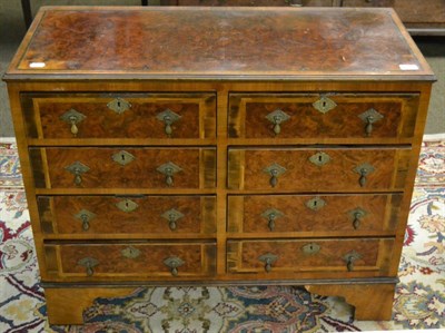 Lot 1368 - A burr walnut string inlaid four height chest of drawers, with further feathered inlay