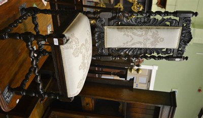 Lot 1381 - A 19th century carved and turned oak hall chair with upholstered back and seat