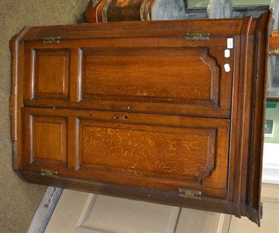 Lot 1403 - George III oak hanging corner cupboard