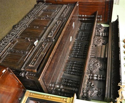 Lot 1408 - An 18th/19th century large carved oak sideboard