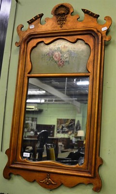 Lot 1413 - A fret carved gilt wall mirror with painted decoration