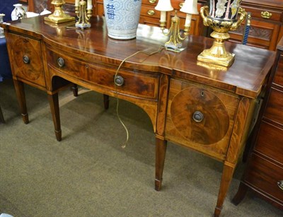 Lot 1416 - George III string inlaid mahogany bow fronted sideboard