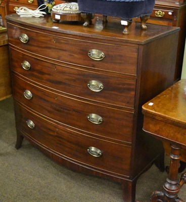 Lot 1418 - George III mahogany bow front four height chest of drawers