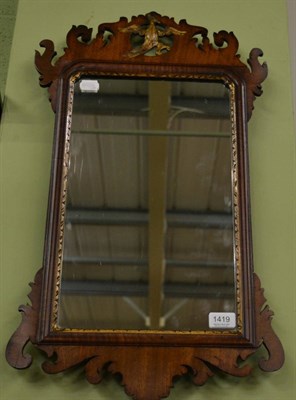 Lot 1419 - George III mahogany fret work mirror, surmounted by a hoho bird