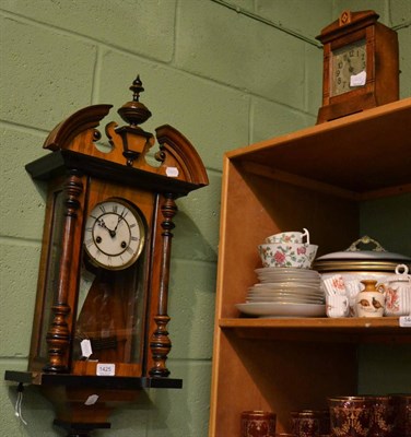 Lot 1425 - A Vienna style wall clock together with a small oak cased mantle clock (2)