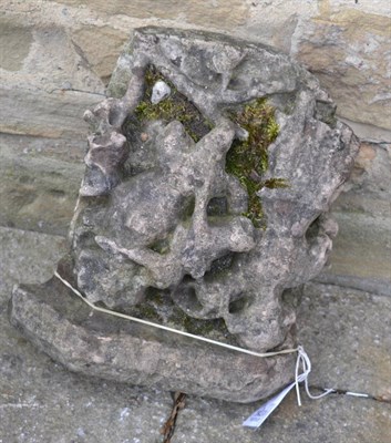 Lot 1431 - An English Medieval carved stone plaque with figures and beasts