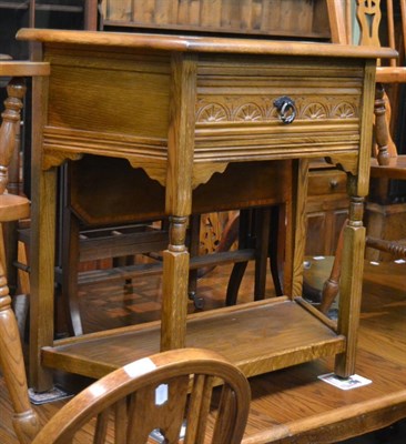 Lot 1438 - An oak hall table