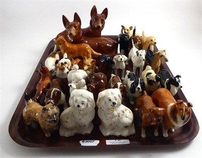 Lot 12 - Beswick dog models on one tray including hounds, poodles and fox etc