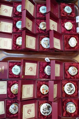 Lot 37 - A collection of seventeen Staffordshire enamel boxes (on two trays)