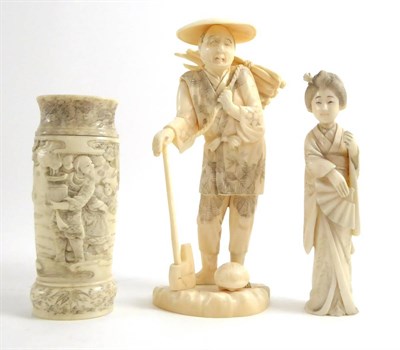 Lot 54 - An early 20th century Japanese ivory okimono depicting a woodcutter; another of a Japanese...