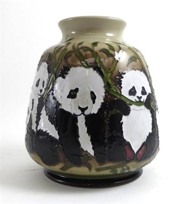 Lot 55 - A Moorcroft vase decorated with a panda family designed by Marie Penkethman