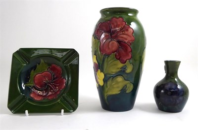 Lot 57 - A Walter Moorcroft Hibiscus vase, an ashtray and a Walter Moorcroft Anemone vase