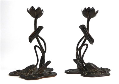 Lot 70 - A pair of Art Nouveau cast water lily candlesticks