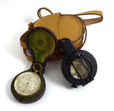 Lot 75 - A pocket compass and another