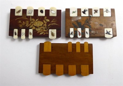 Lot 104 - Two game counters and a plain example