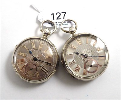 Lot 127 - Two silver open faced lever pocket watches, both with silver engine turned dials