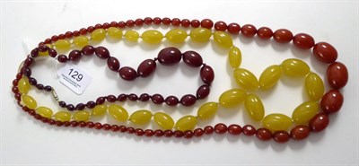 Lot 129 - Two bakelite bead necklaces and a yellow bead necklace