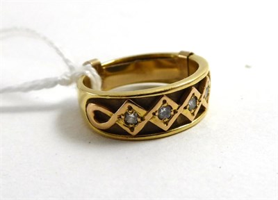 Lot 145 - An 18ct gold diamond five stone half hoop ring