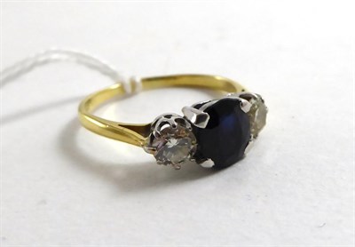 Lot 149 - A sapphire and diamond ring, total estimated diamond weight 0.55 carat approximately