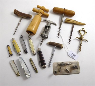 Lot 158 - Seven assorted corkscrews, white metal miniature figure hunting group and eight pen knives...