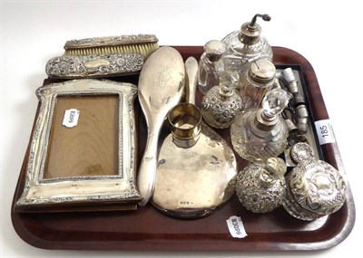 Lot 185 - A group of silver including dressing table brushes, hand mirror, photograph frame, silver...