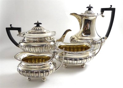 Lot 200 - A four piece silver tea service